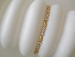 Load image into Gallery viewer, CUBIC RIBBON BRACELET

